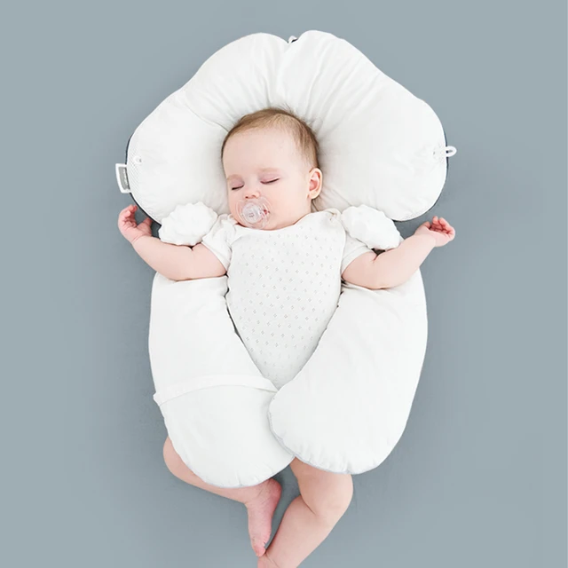 babies sleep with a pillow