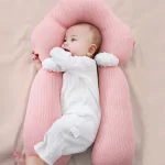 babies sleep with a pillow