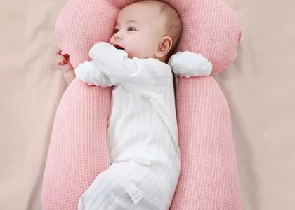 babies sleep with a pillow